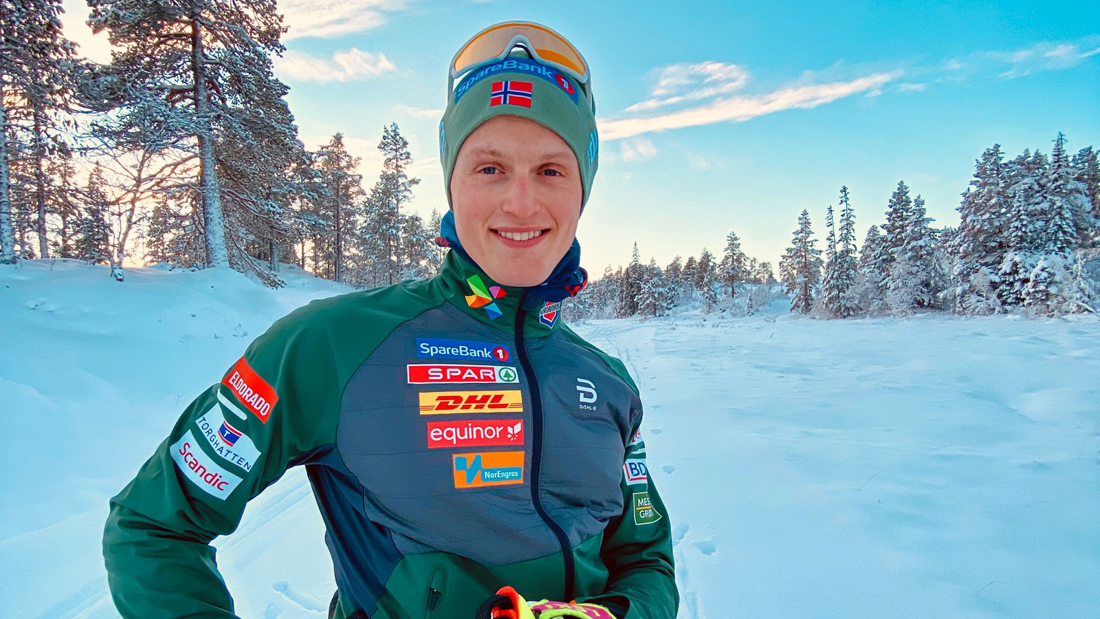 Erik Husby i skidress stående i løypa